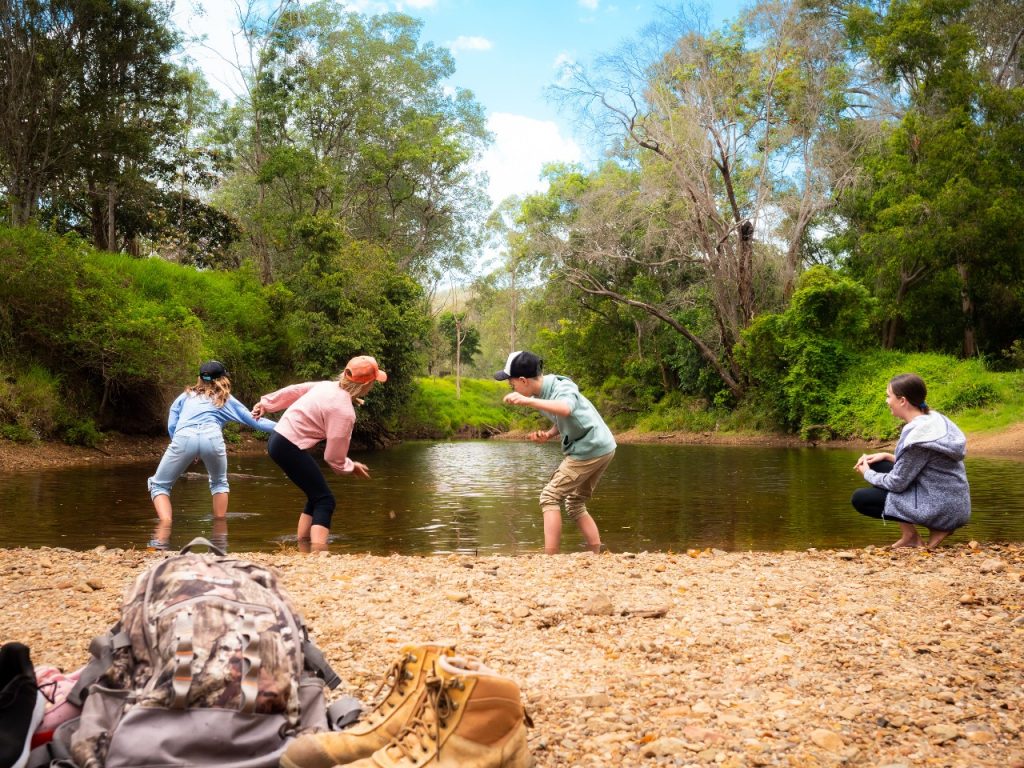 Neurum Creek kids skip stones