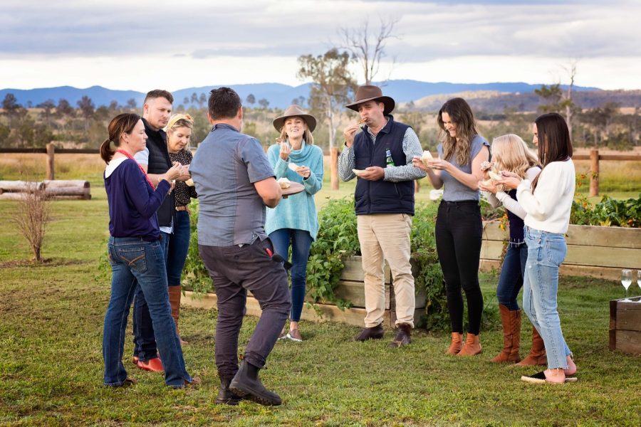 Brisbane Valley Farm Direct people stand around socialising and eating