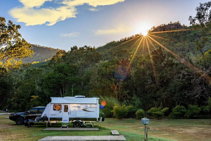 Esk Caravan Park sun peaking over mountain