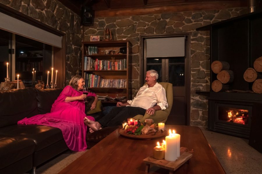 The Stonehouse Retreat couple sitting on couch