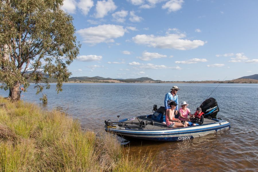 NRMA Lake Somerset Holiday Park fishing boat with family