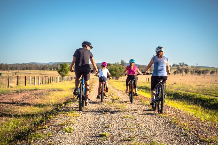 Family group riding along the Brisbane Valley Rail Trail