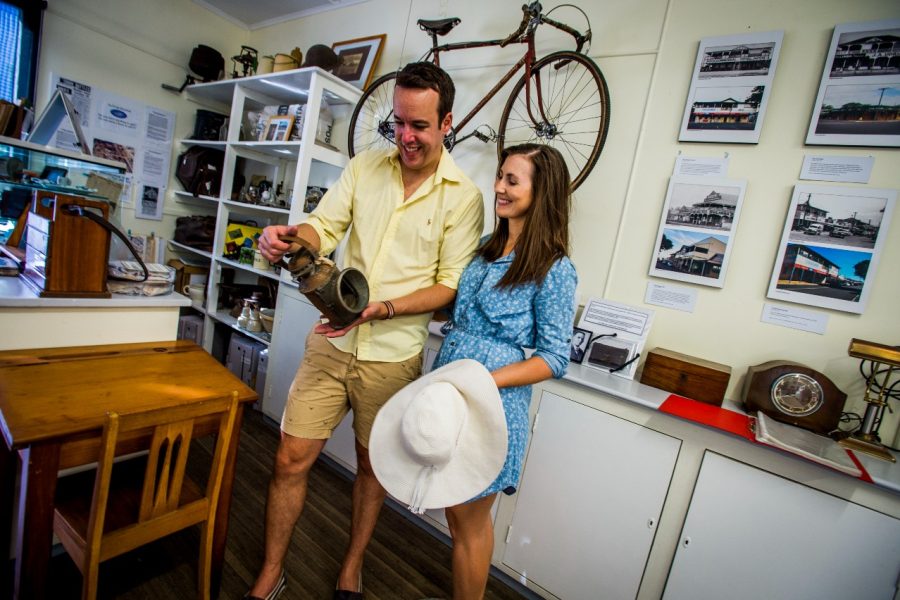 Toogoolawah History Museum couple observe object