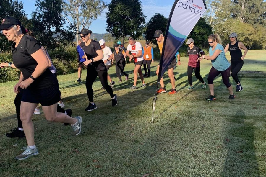 Yowie Parkrun at Kilcoy with a group of people starting the run.